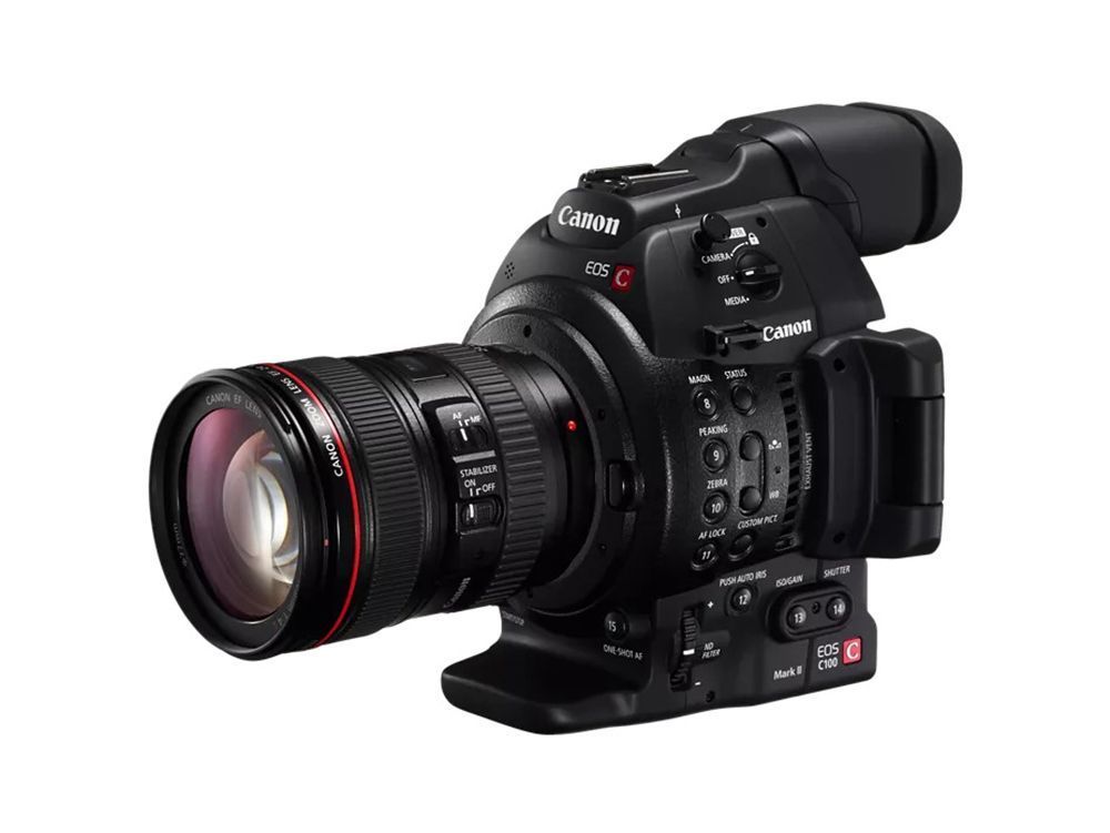 Canon DSLR camera with attached lens on a white background