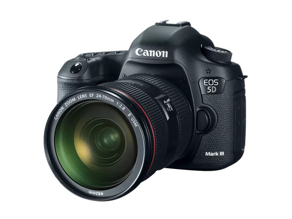 Canon EOS 5D Mark III DSLR camera with large lens on a white background