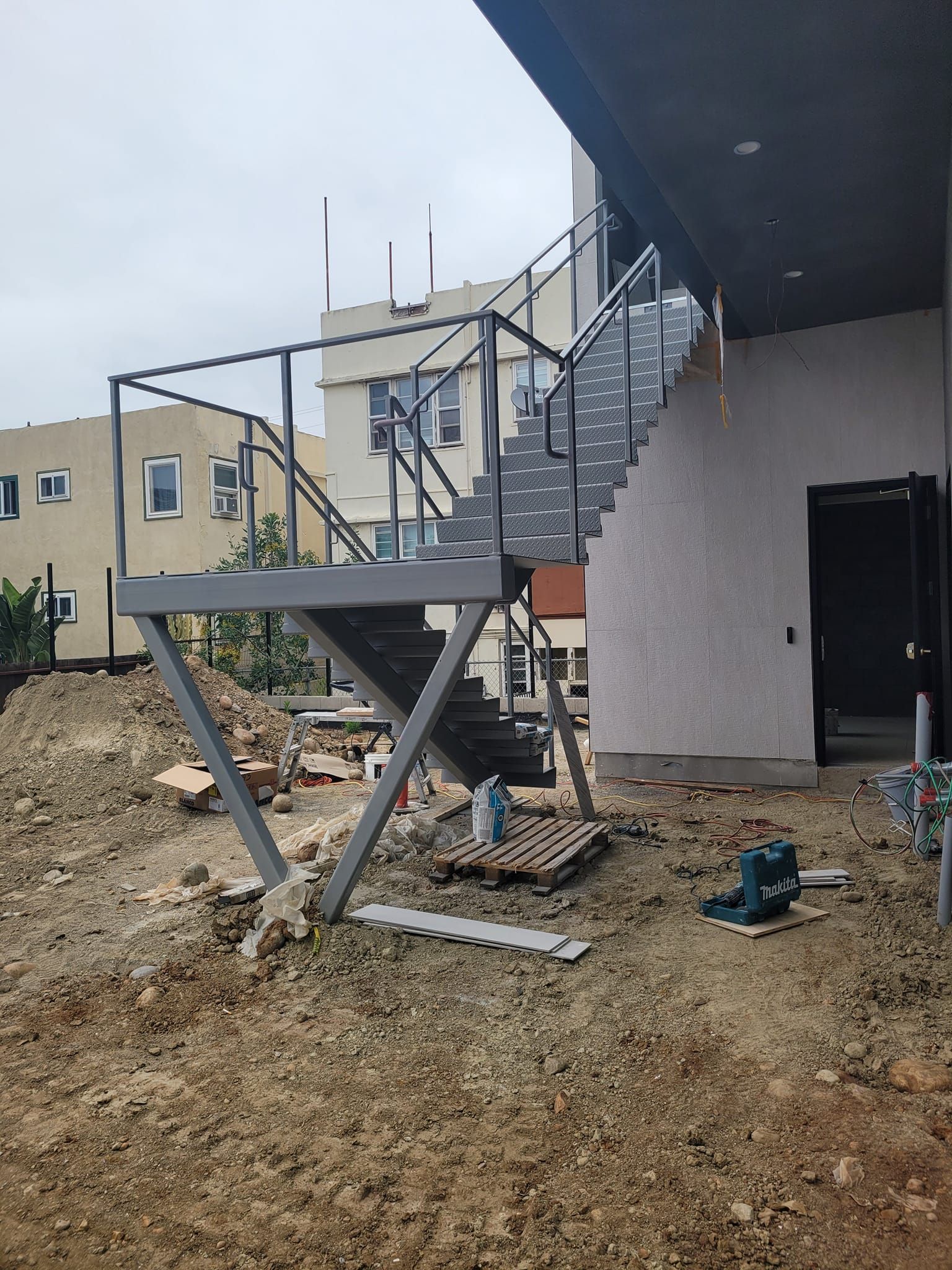 A staircase is being built on the side of a building.
