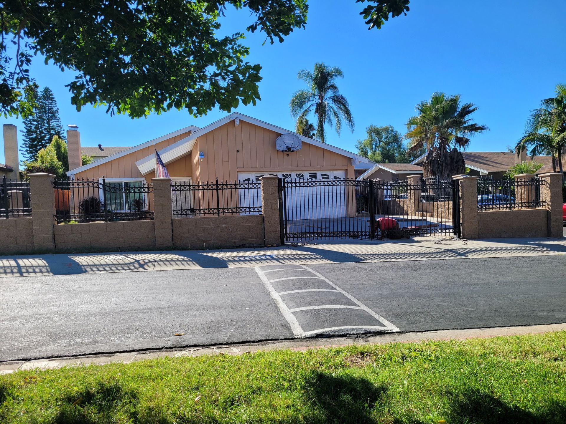 A house with a car parked in front of it