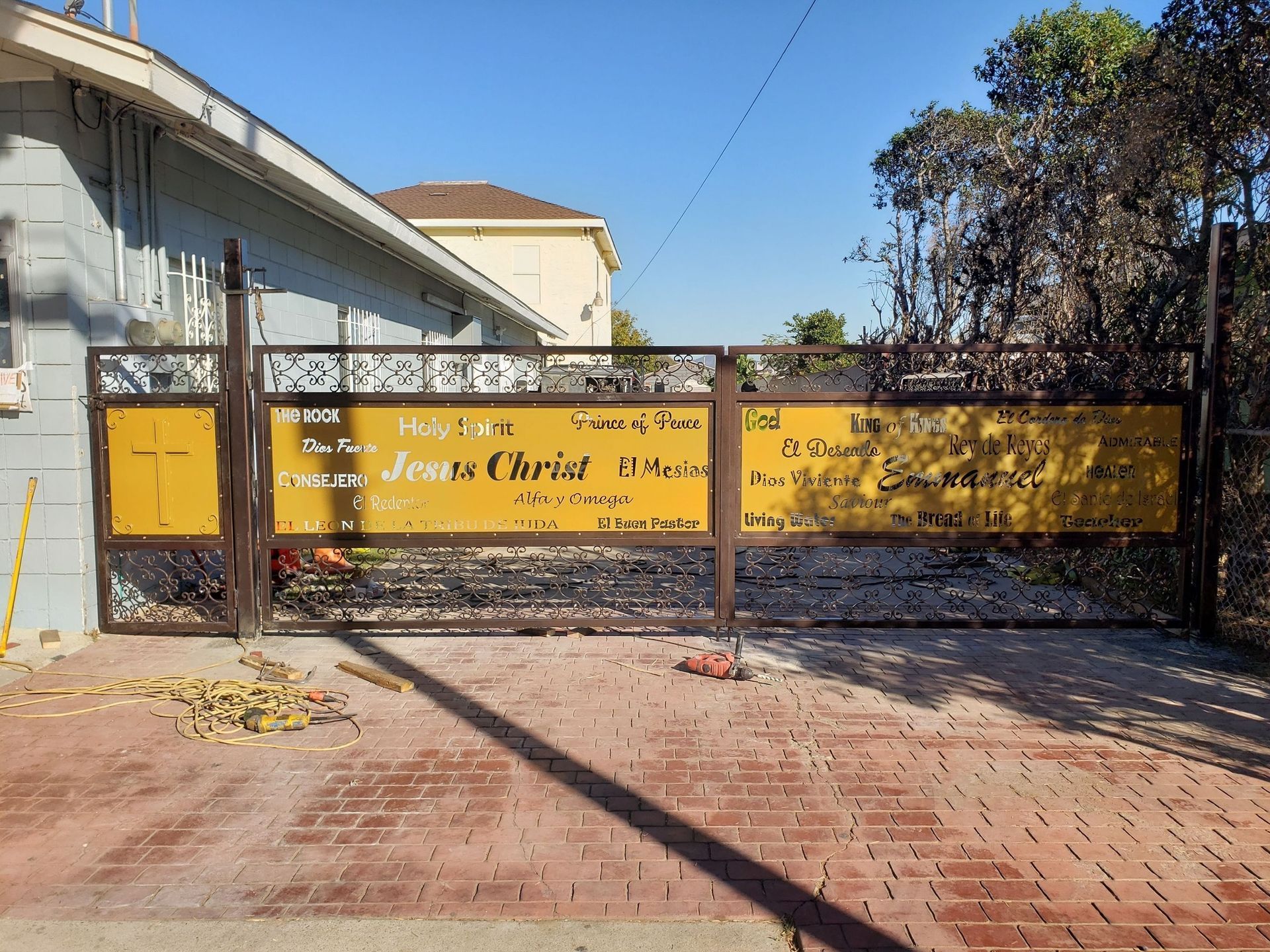 A yellow sign that says jesus to christ on it