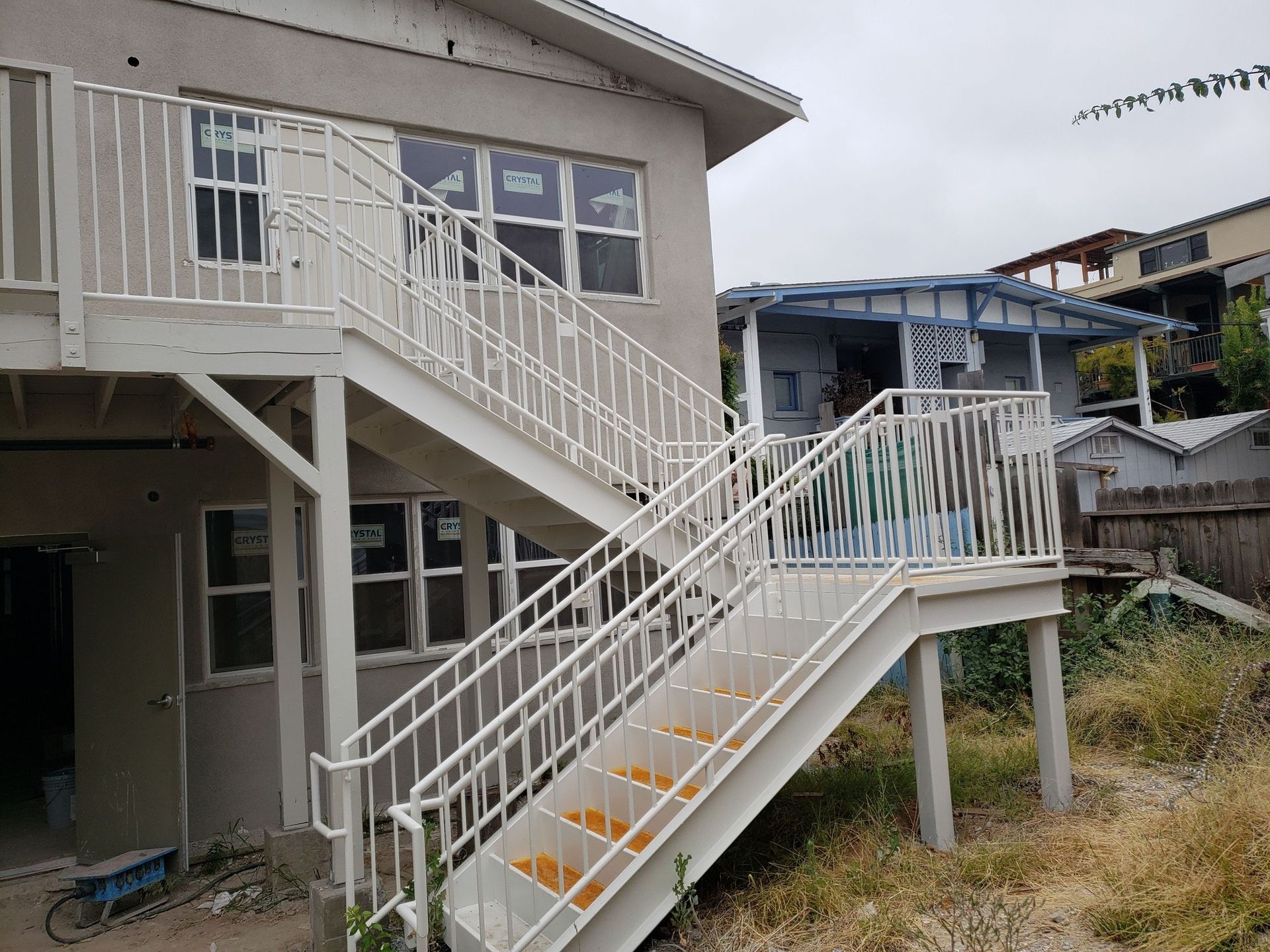 A house with stairs leading up to the second floor