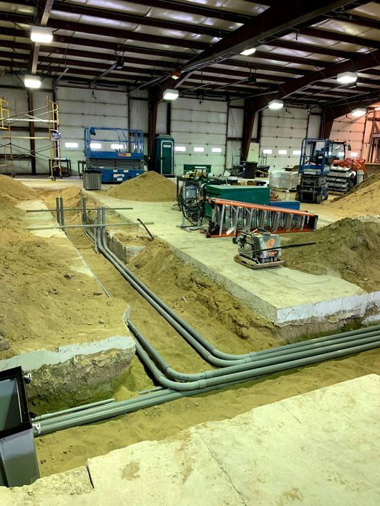 removing selective sections of the concrete floor of an industrial building in Williamsburg MI