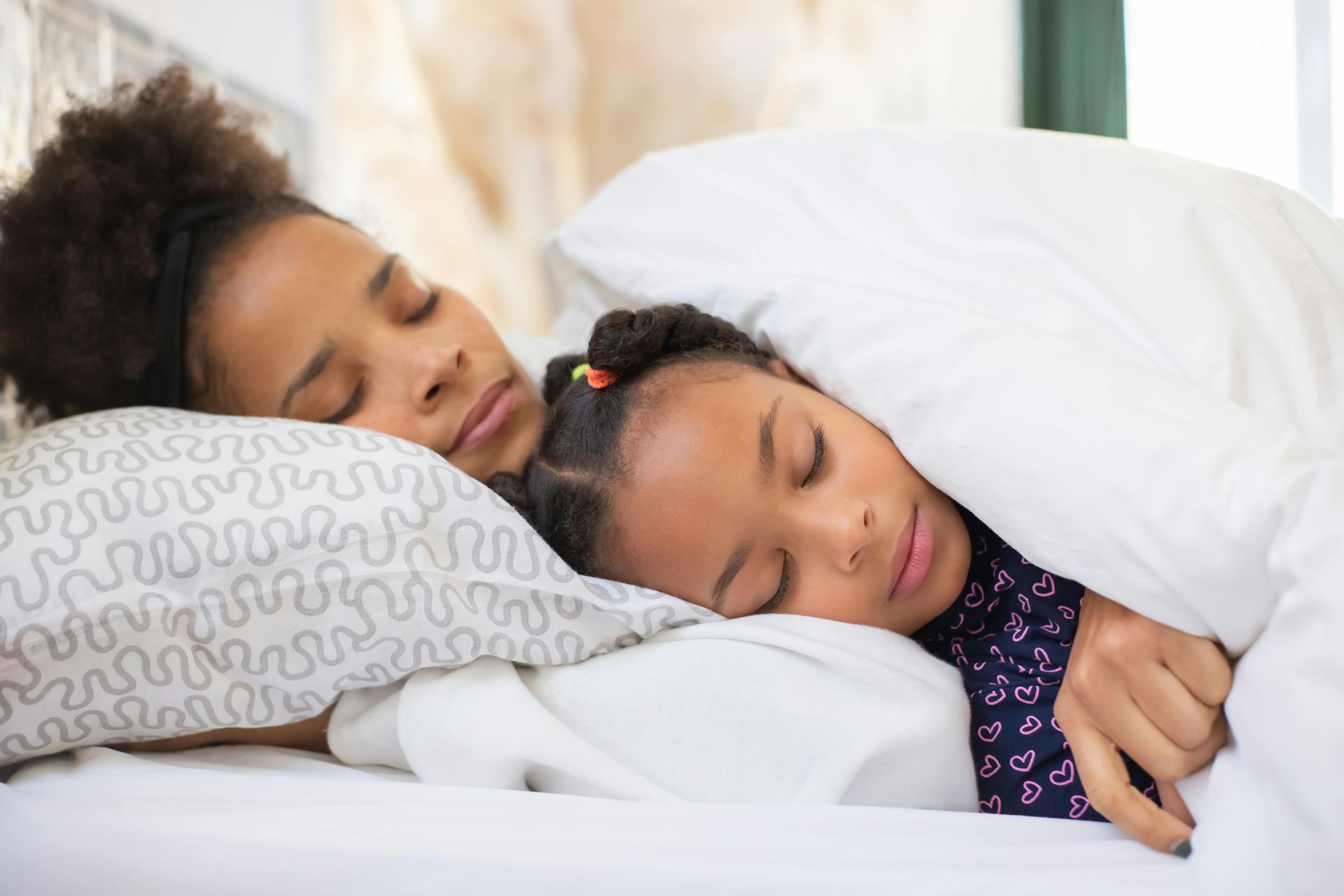 A family sleeping comfortably