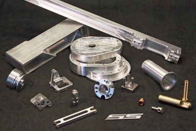 A bunch of metal parts with the letter sg on them