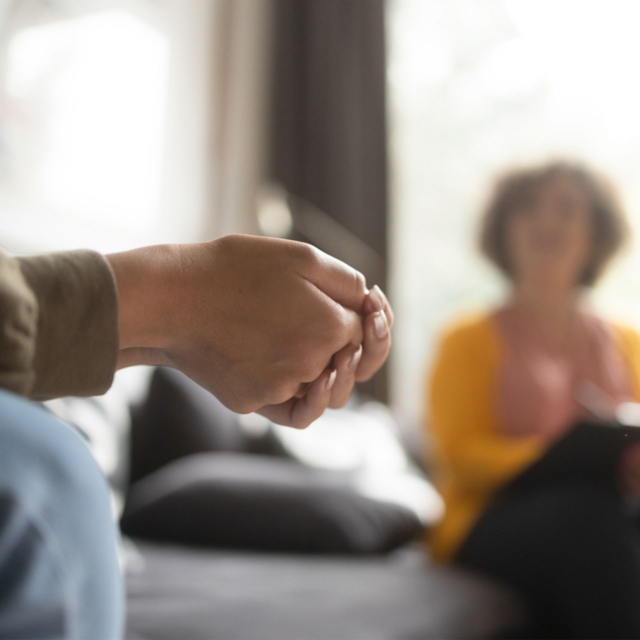 Girl's Hands With Fingers Crossed Nervously — Clearwater, FL — Defining Moments Counseling