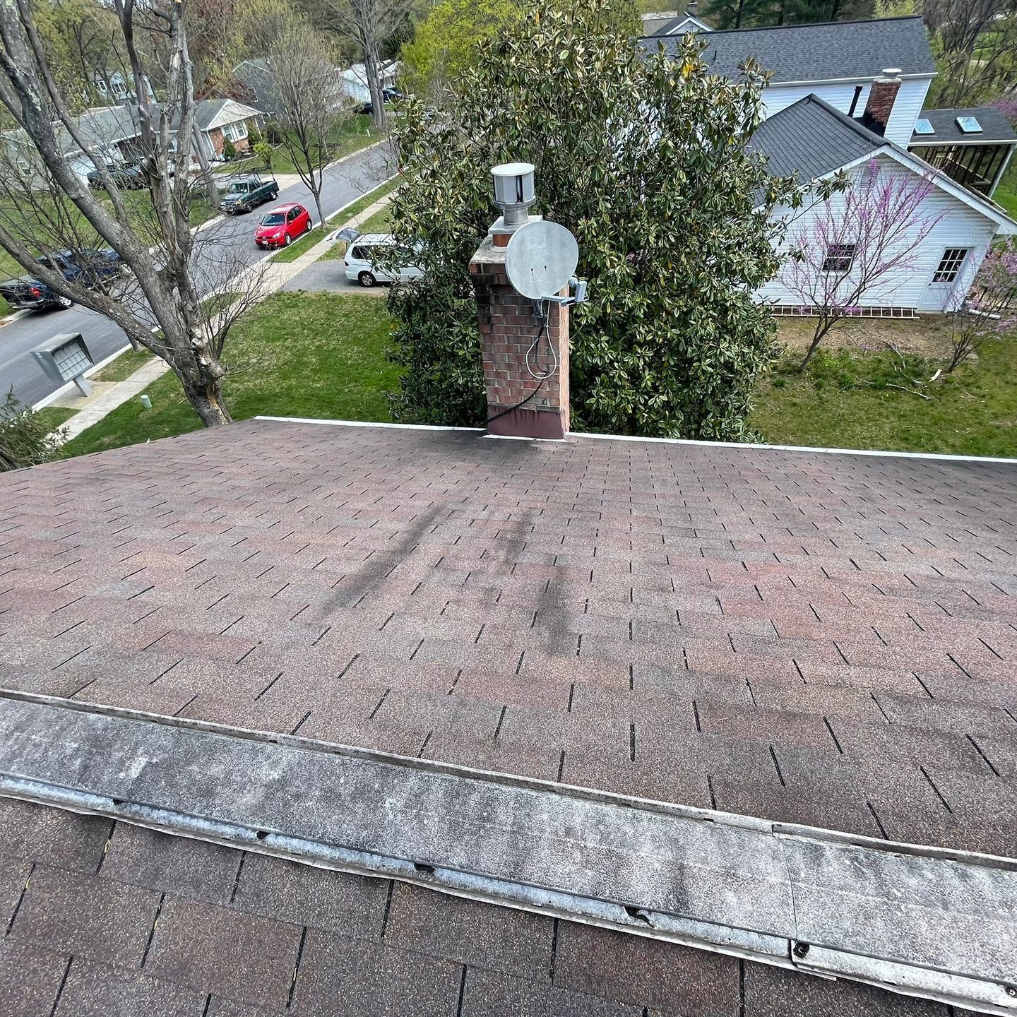 Roof Replacement Weathering on Roof in Columbia MD Maryland covered by American Remodeling Corp.