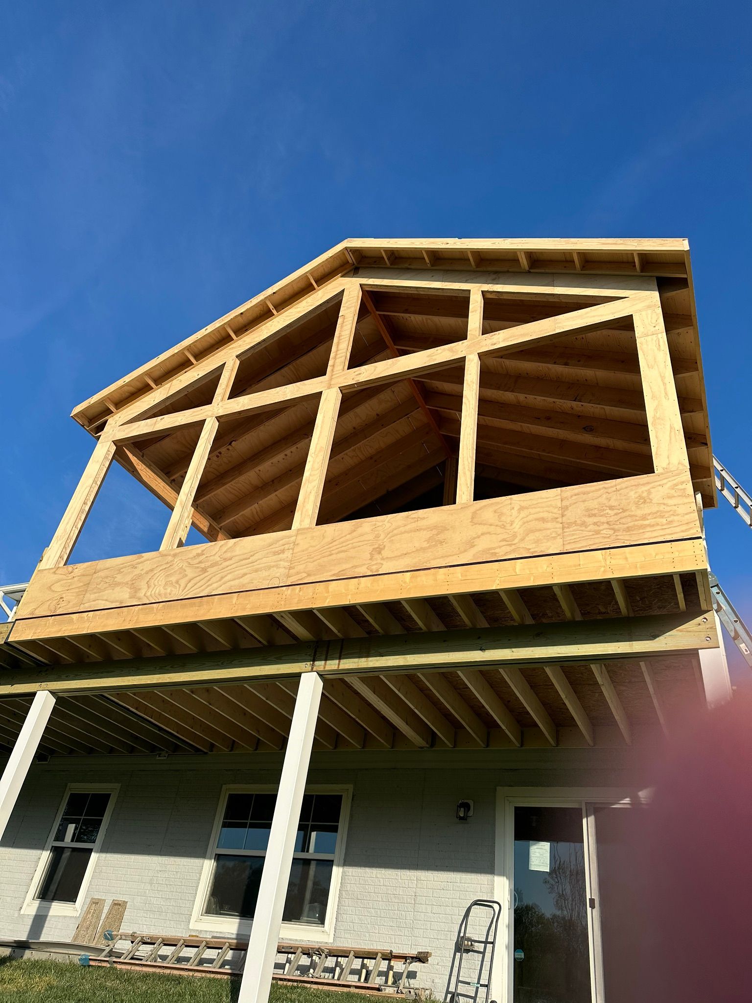 Decking Home Addition new room under construction by American Remodeling Corp