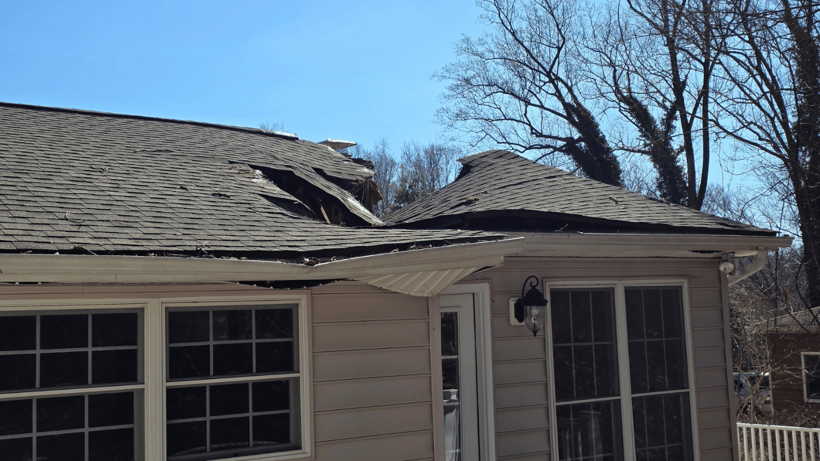 Tree Damaged Roof in Arnold Maryland. Insurance Specialist Roofing Company Public Adjusters