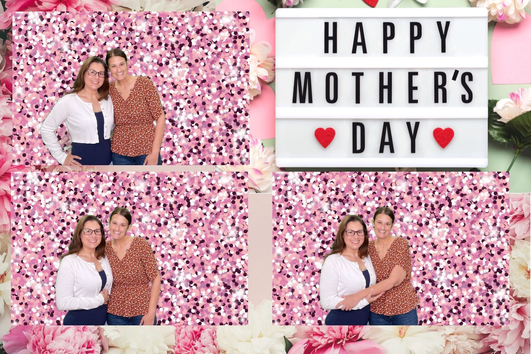 Two women are standing next to each other in front of a sign that says `` happy mother 's day ''.