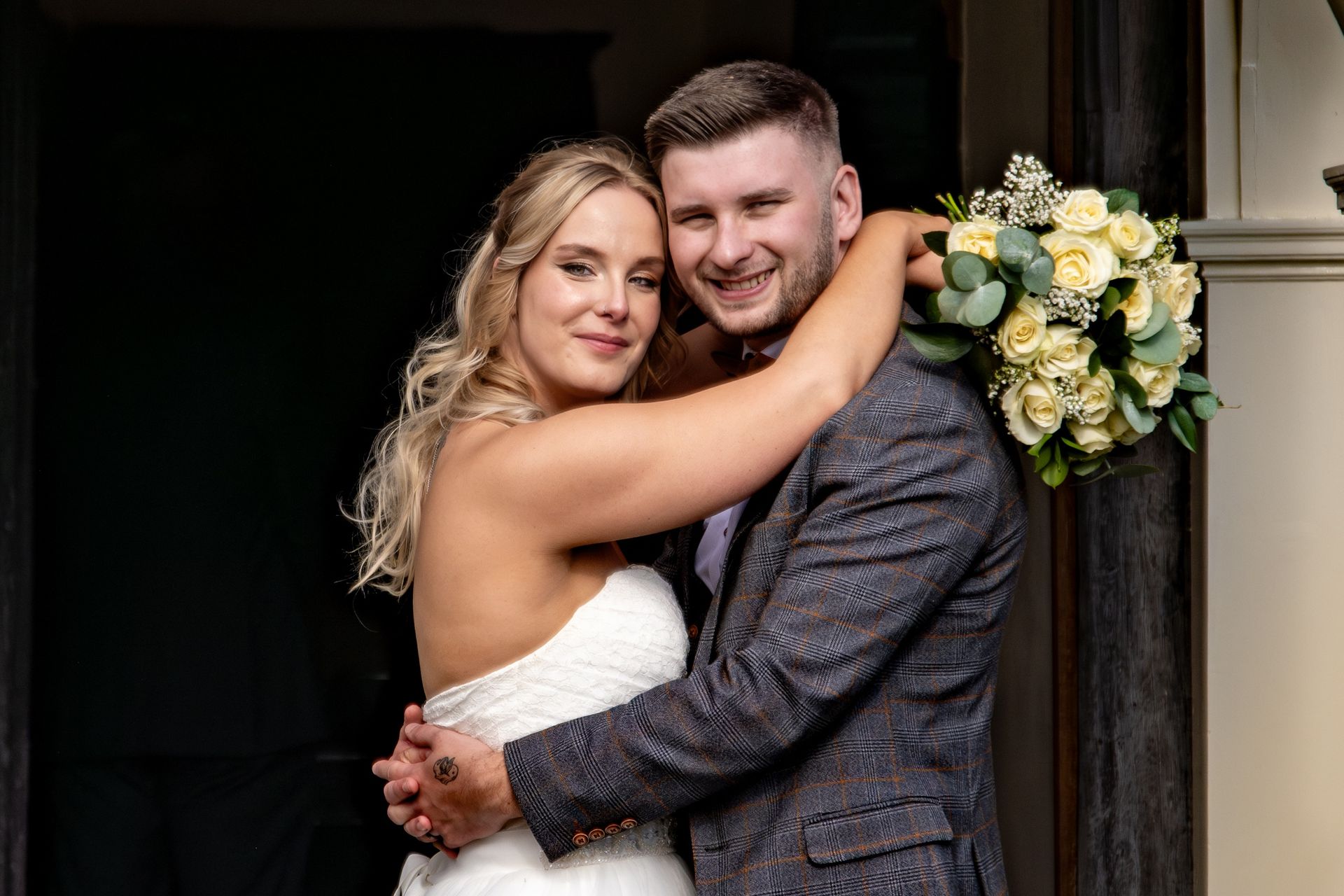 LS Photography - Trusted wedding photographer, hugging couple