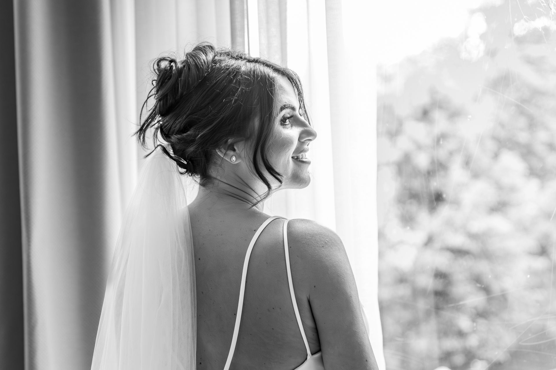 Your trusted wedding photographer - LS Photography - bride black and white