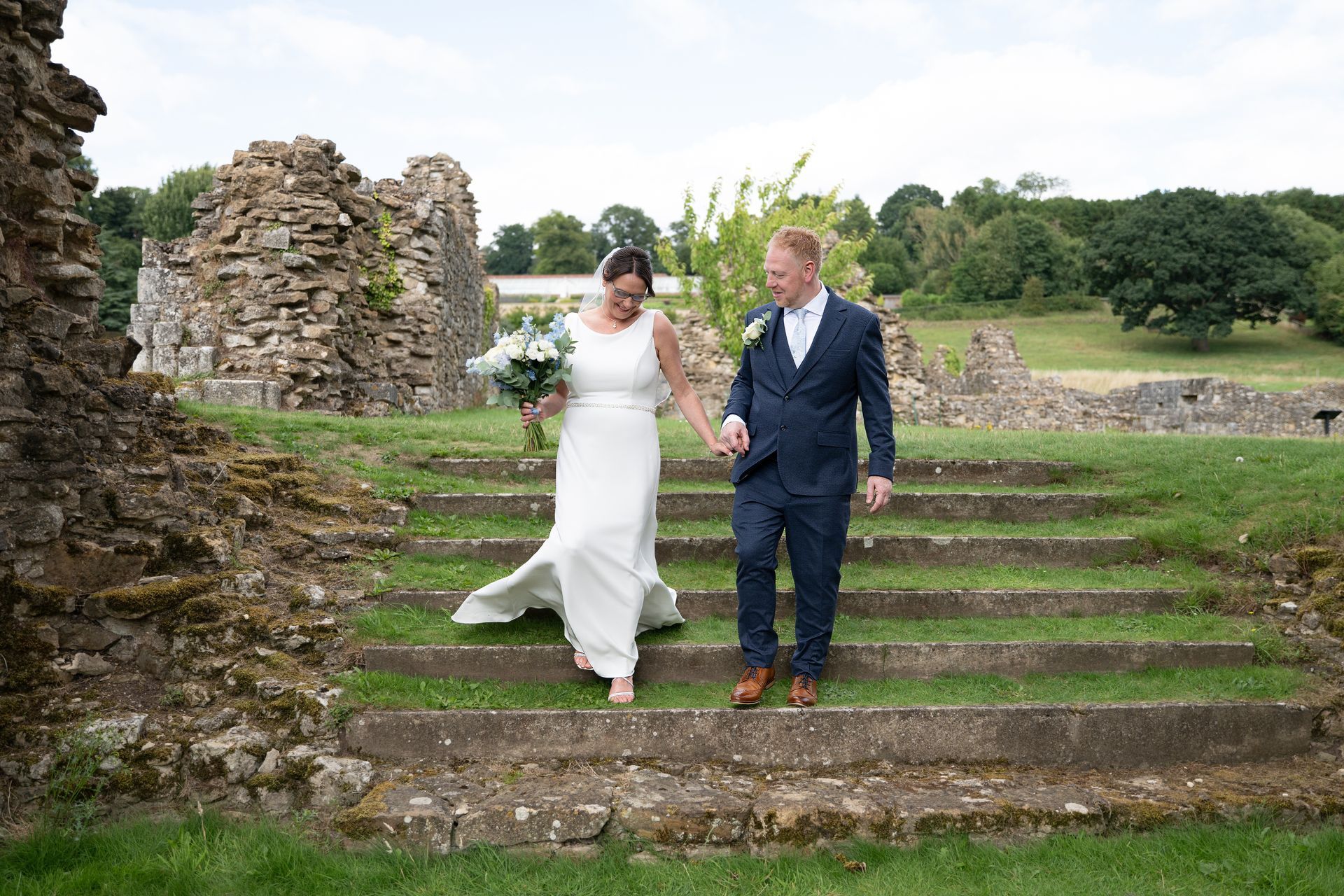 Your trusted wedding photographer - LS Photography - walking down steps