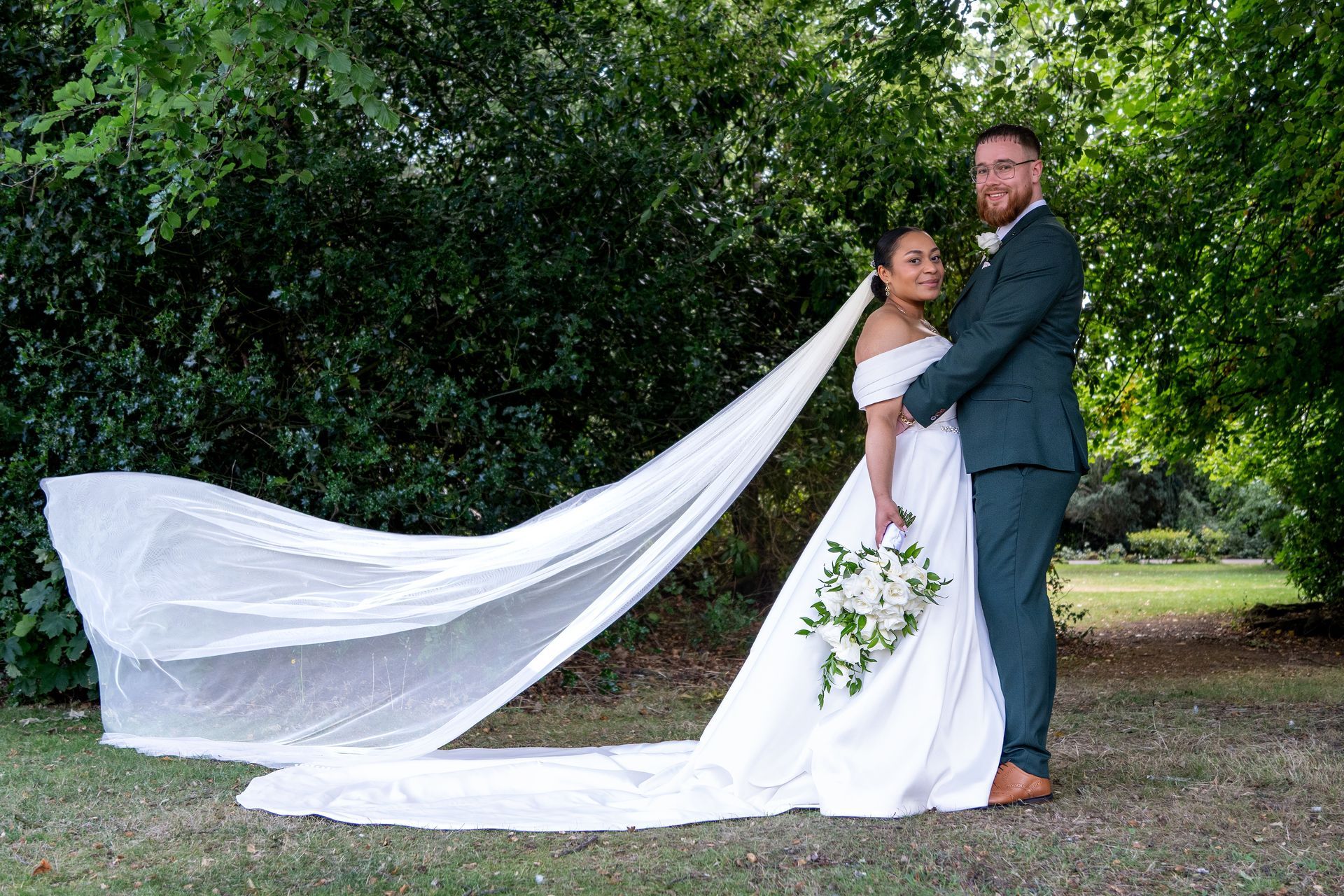 Your trusted wedding photographer - LS Photography - veil blowing