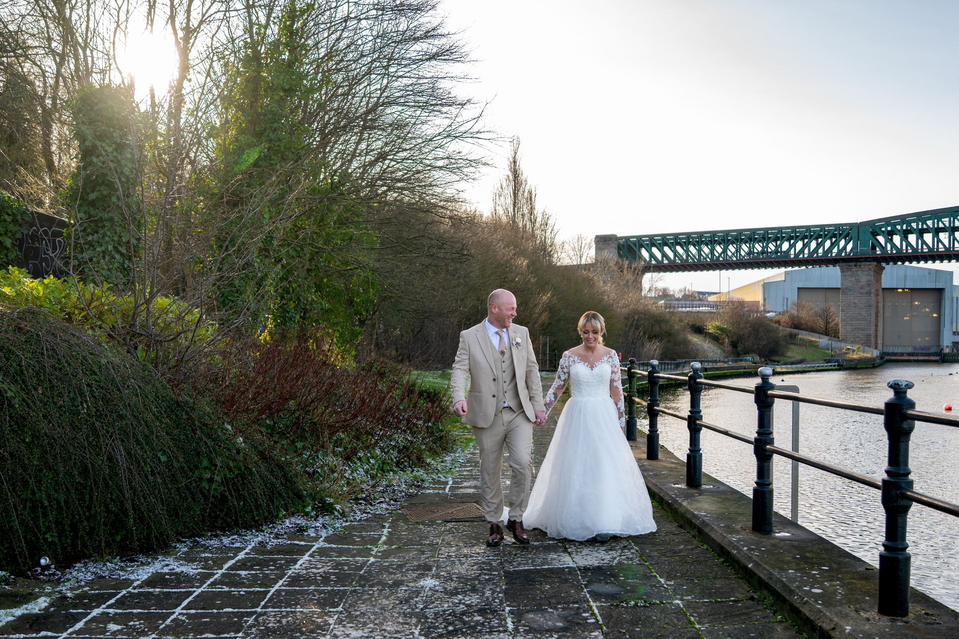 Your trusted wedding photographer - LS Photography - by a river