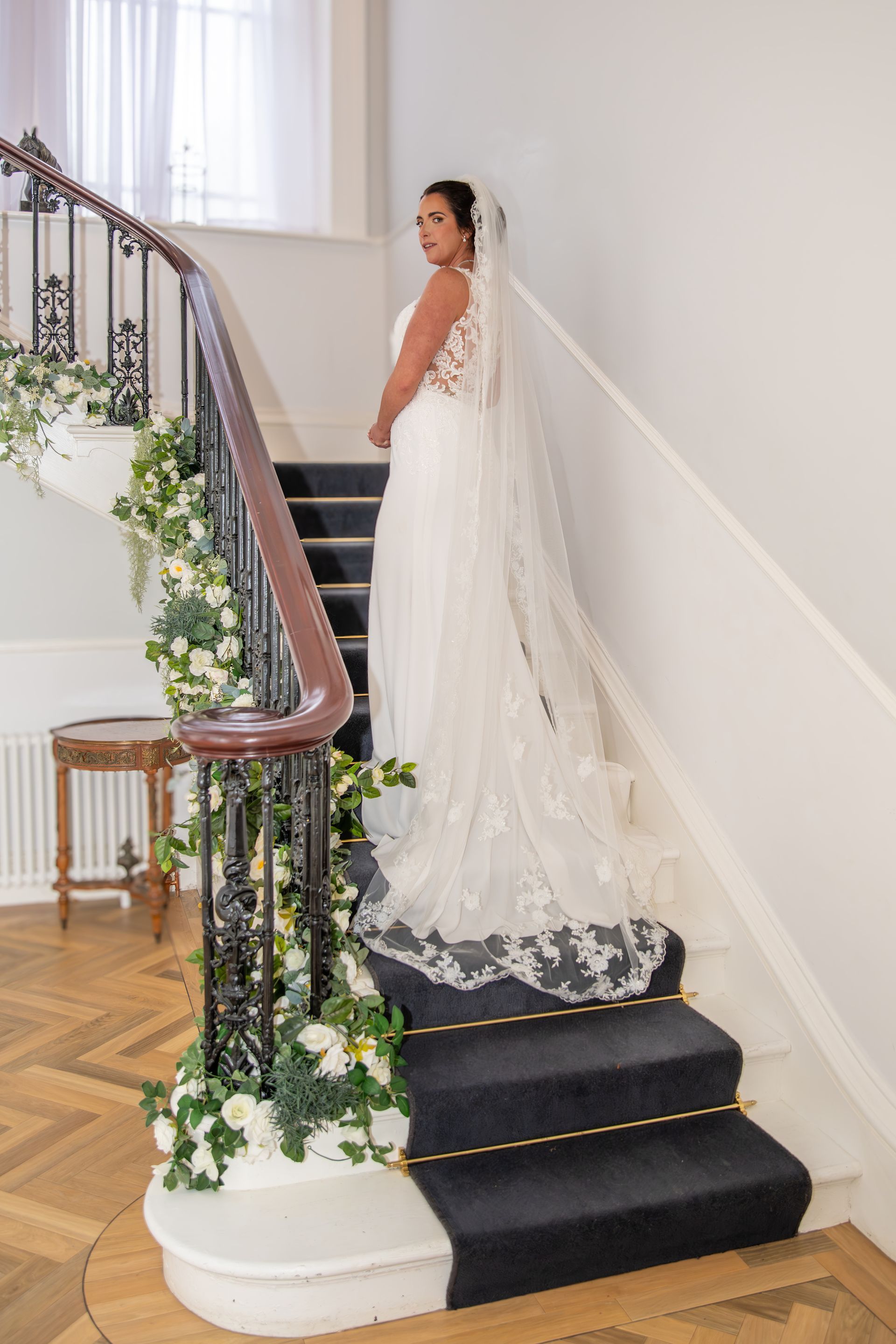 Your trusted wedding photographer in the UK - LS Photography - bride on stairs