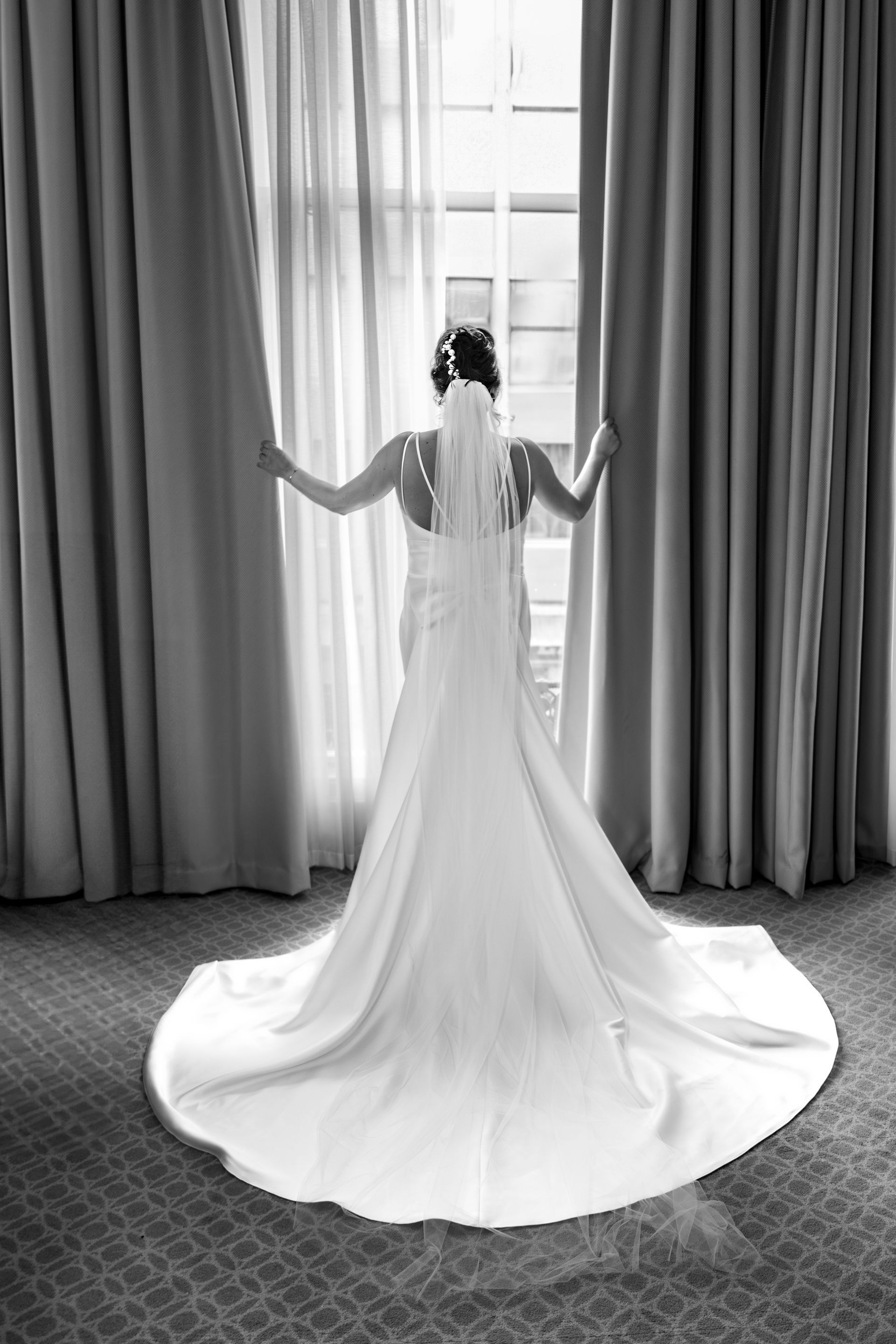 Trusted wedding photographer - LS Photography - bride at window