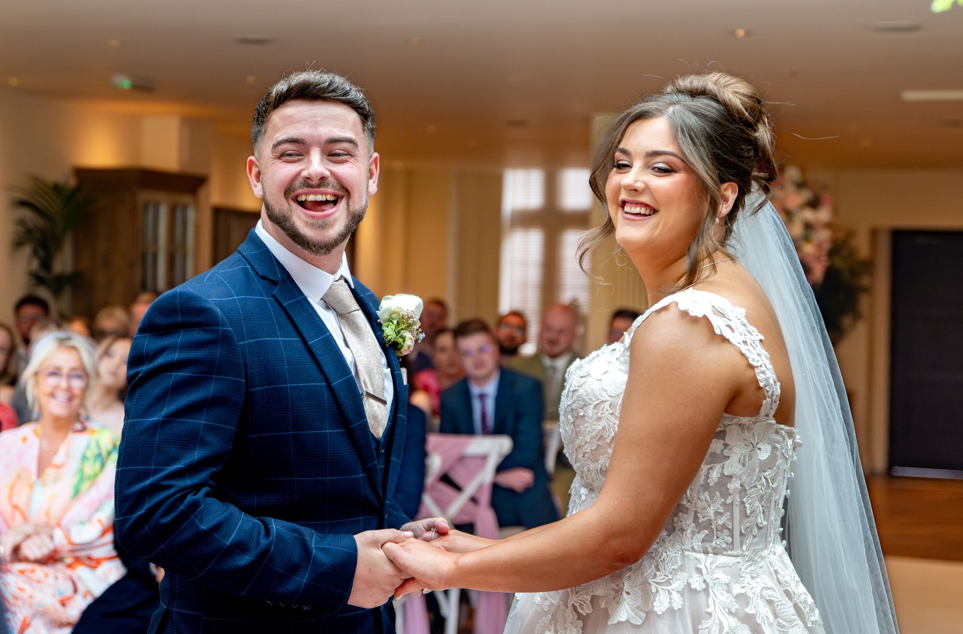 Trusted wedding photographer - LS Photography - vowels laughing