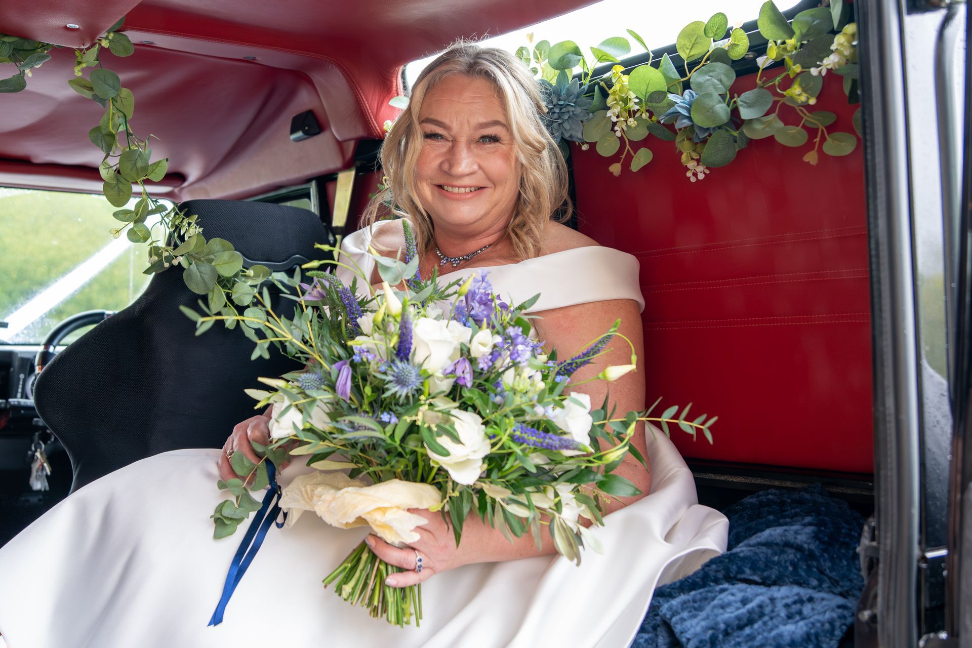 L.S. Photography - your local wedding photographer - bride in car