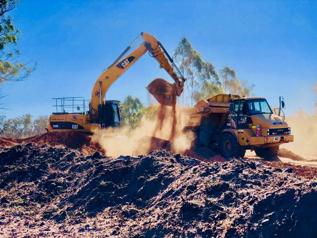 Digging Soil — Marulan, NSW — Coopers Earthmoving Pty Ltd