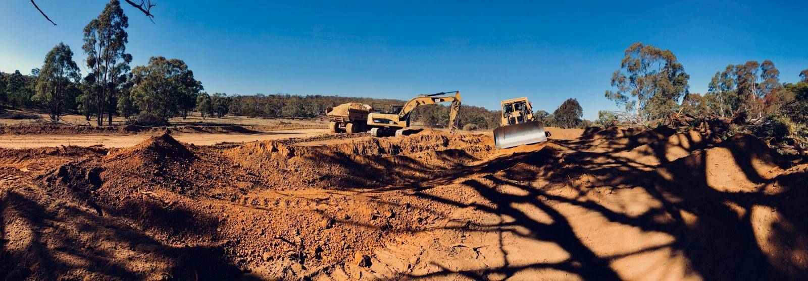 Yellow Bulldozer in Earthworks — Marulan, NSW — Coopers Earthmoving Pty Ltd
