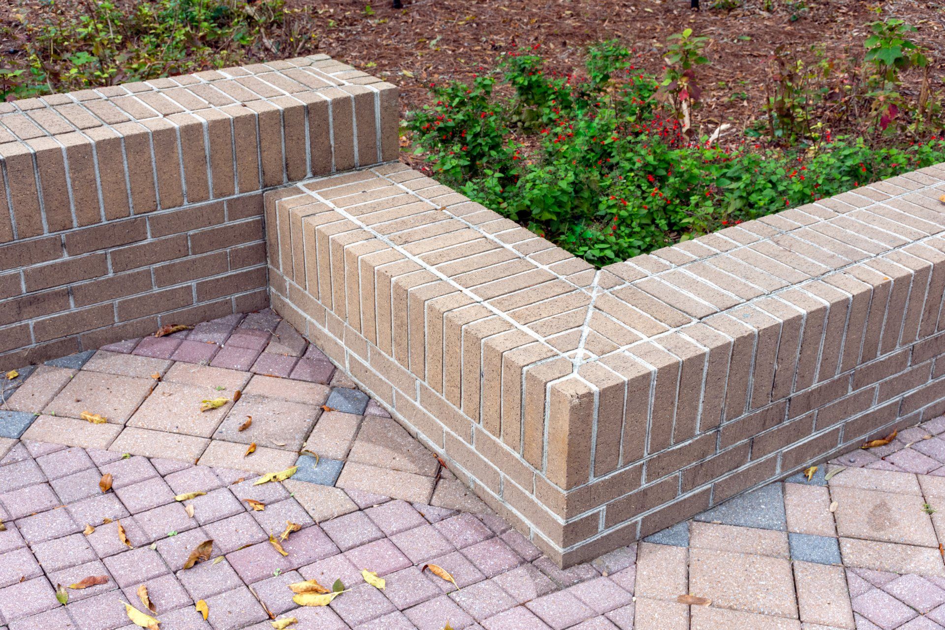 Beautiful design and high quality materials create a retaining wall which doubles as extra seating in the garden.