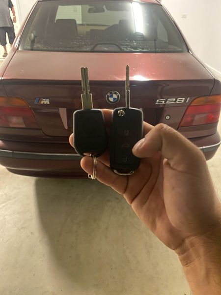 A close up of a sliding gate with a lock on it.