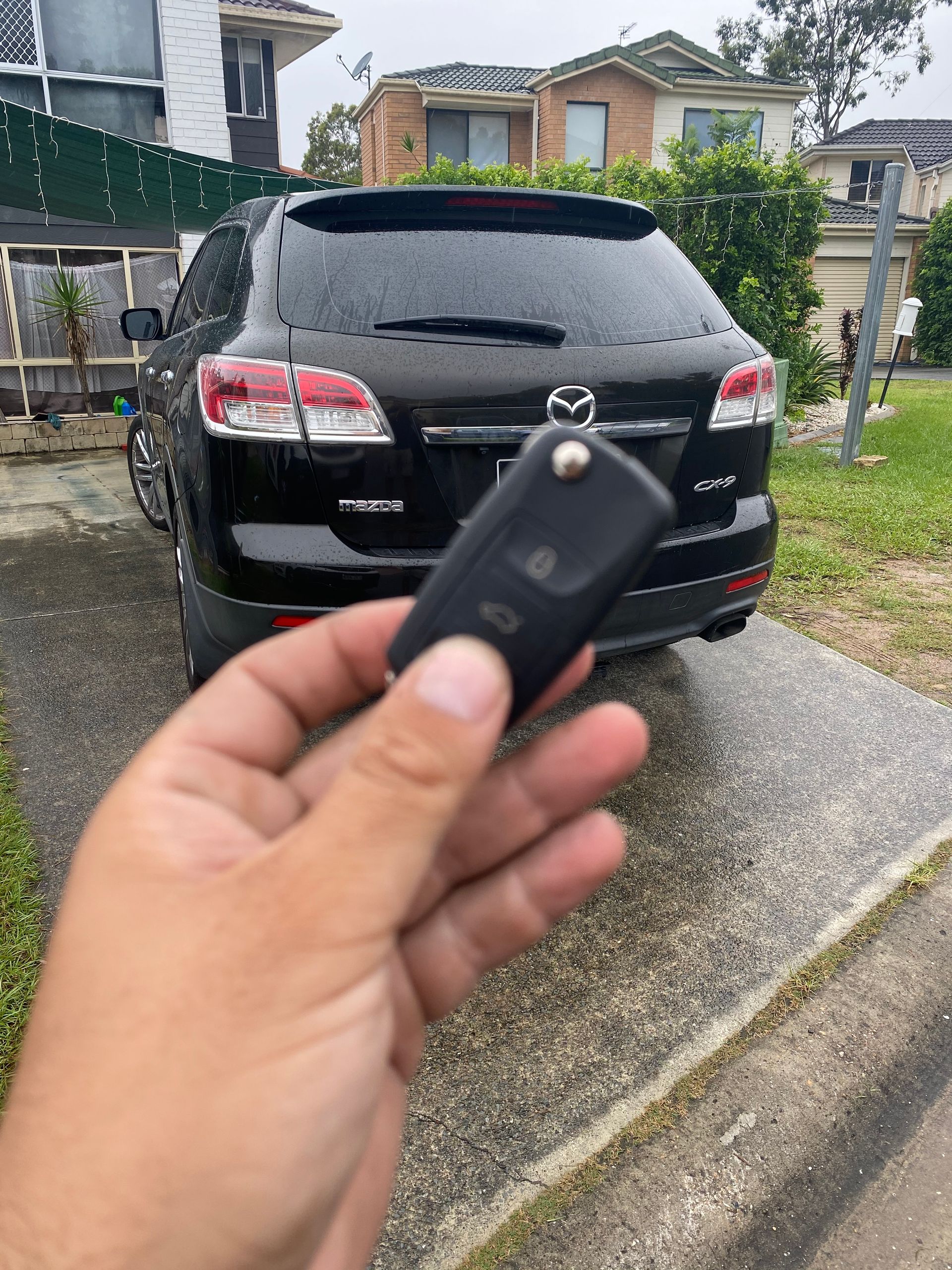 A close up of a key in a lock on a door.