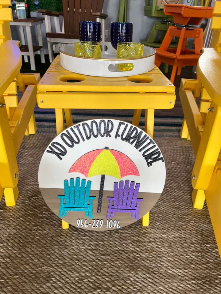 A yellow table with a sign that says yo outdoor furniture
