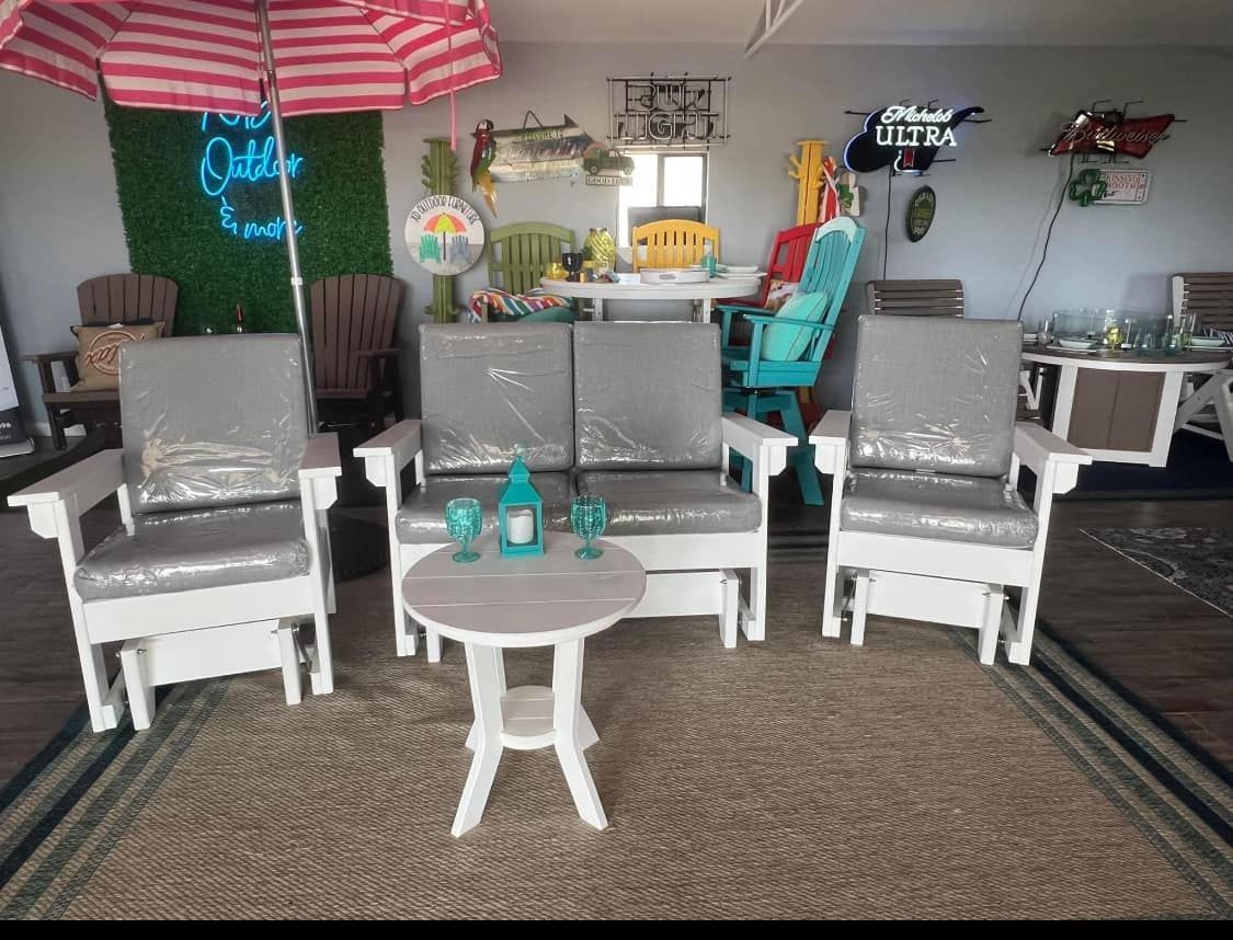 A living room filled with furniture and an umbrella.