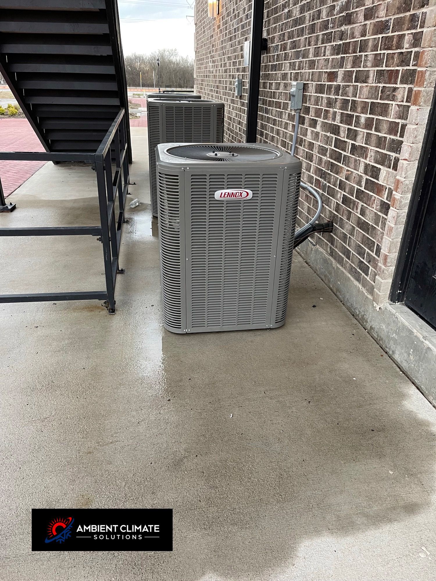 Installing a new energy-efficient air conditioning unit.