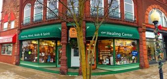 the healing center is located on the corner of a brick building