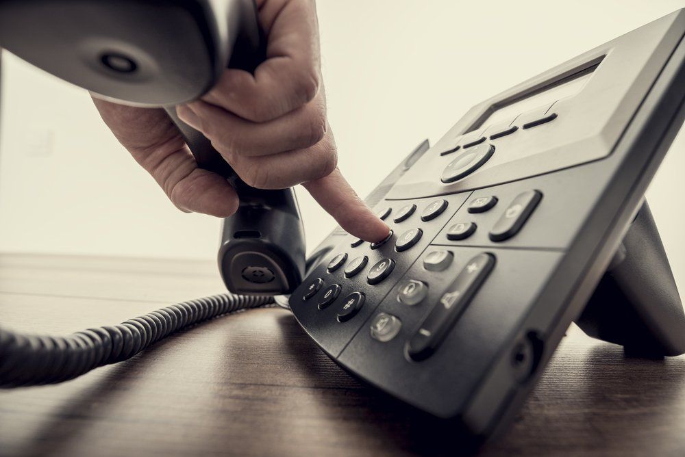 Dialing Phone Number — Support Network in Forster, NSW