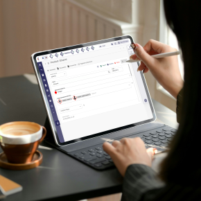 Image of someone holding a tablet
