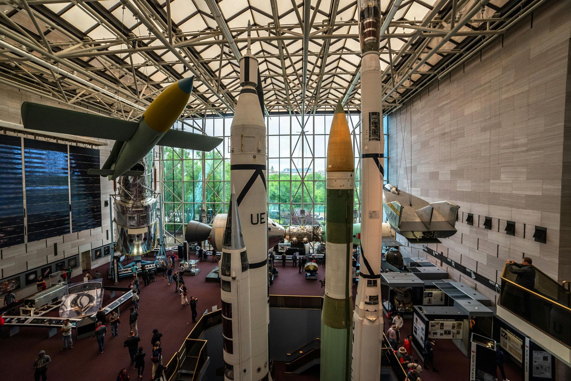 inside Smithsonian space museum with rockets and planes