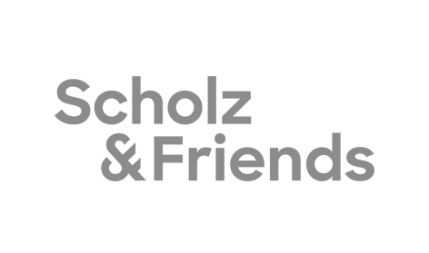 Ein graues Logo von Scholz & Friends auf weißem Hintergrund.