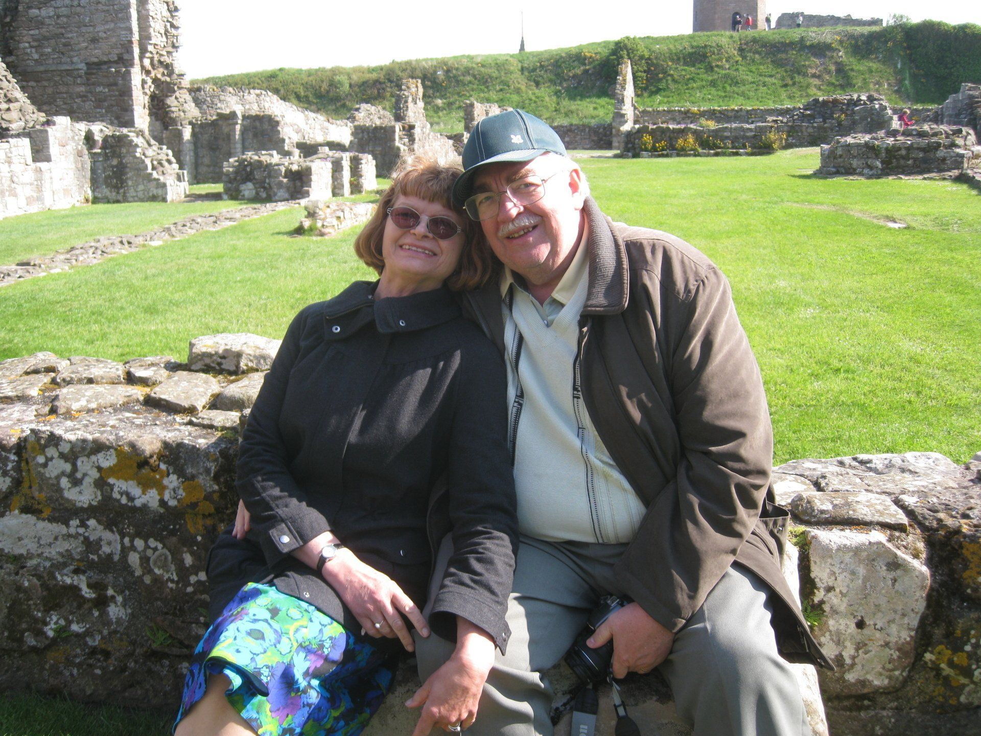 A man and a woman are posing for a picture