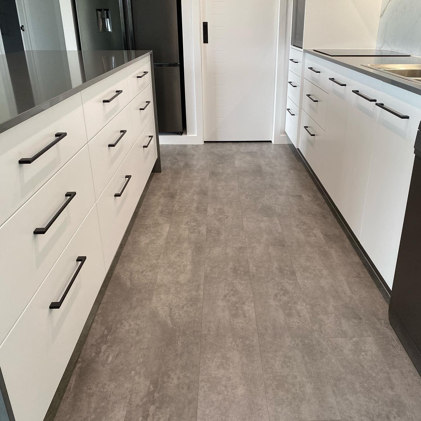 Custom White Cabinet with Dark Brown Hardware — Keppel Kitchens in Yeppoon, QLD