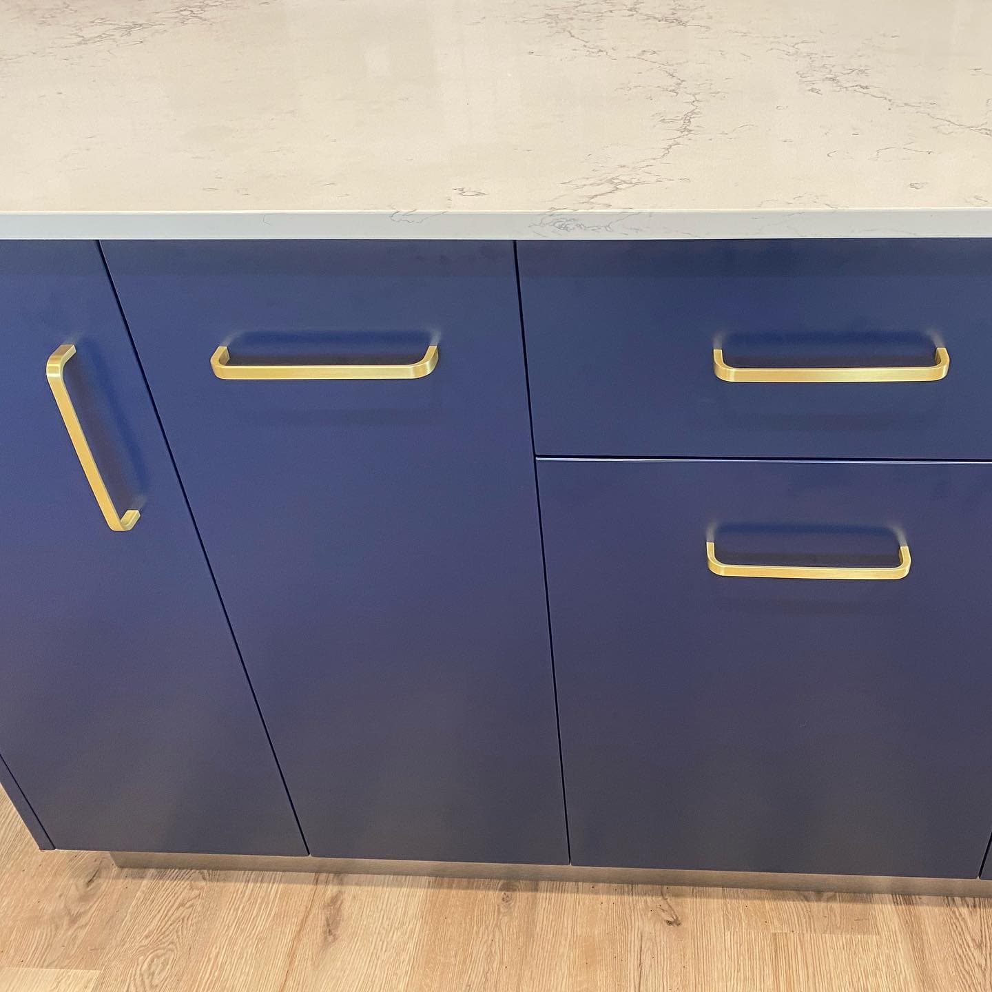Blue Cabinets with Gold Plated Cabinet Handles — Keppel Kitchens in Yeppoon, QLD