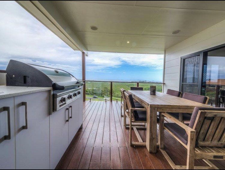 Kitchen Area With Kitchen Cabinets — Keppel Kitchens in Yeppoon, QLD
