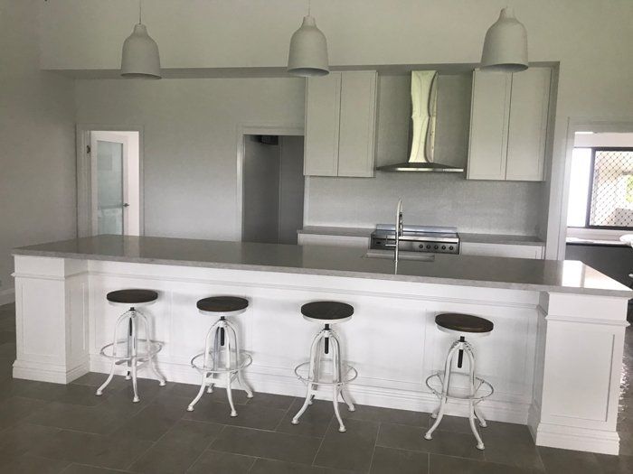 Kitchen With Circular Chairs — Keppel Kitchens in Yeppoon, QLD