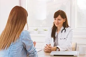 Patient and Female Doctor — Pembroke Pines, FL — Huse Artificial Limb & Brace