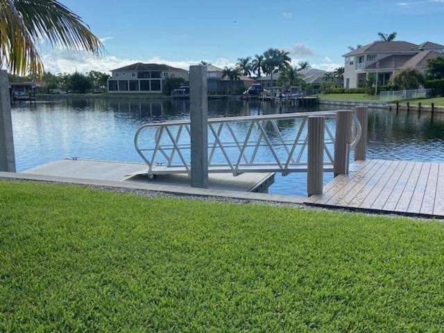 Steel Bridge with Grass — Marco Island, FL — Collier Seawall & Dock