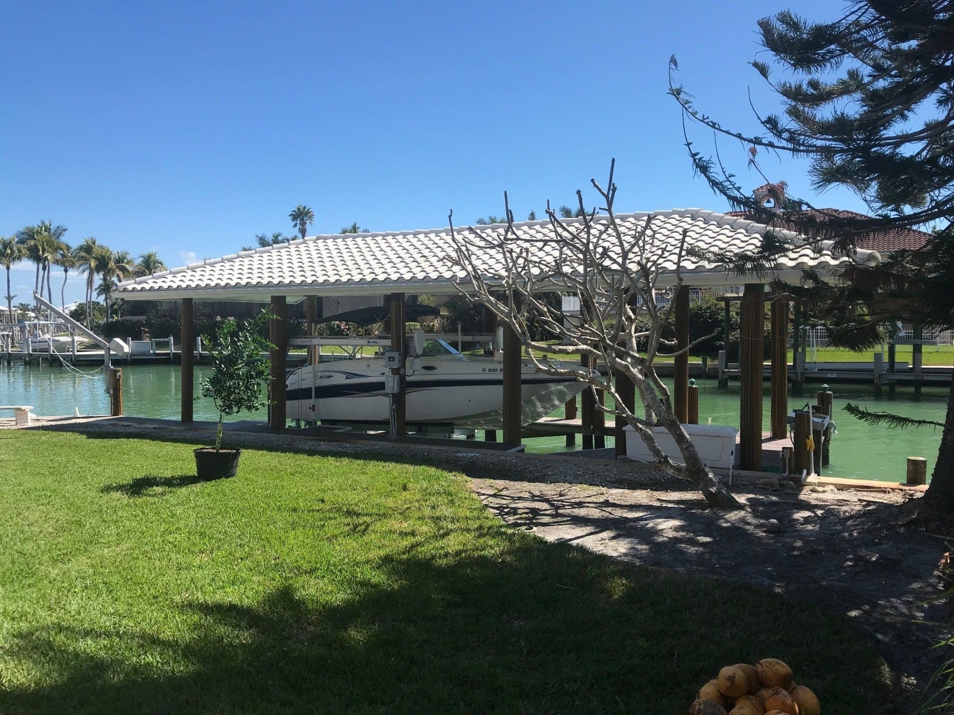 Deck with Roof Near Grass — Marco Island, FL — Collier Seawall & Dock
