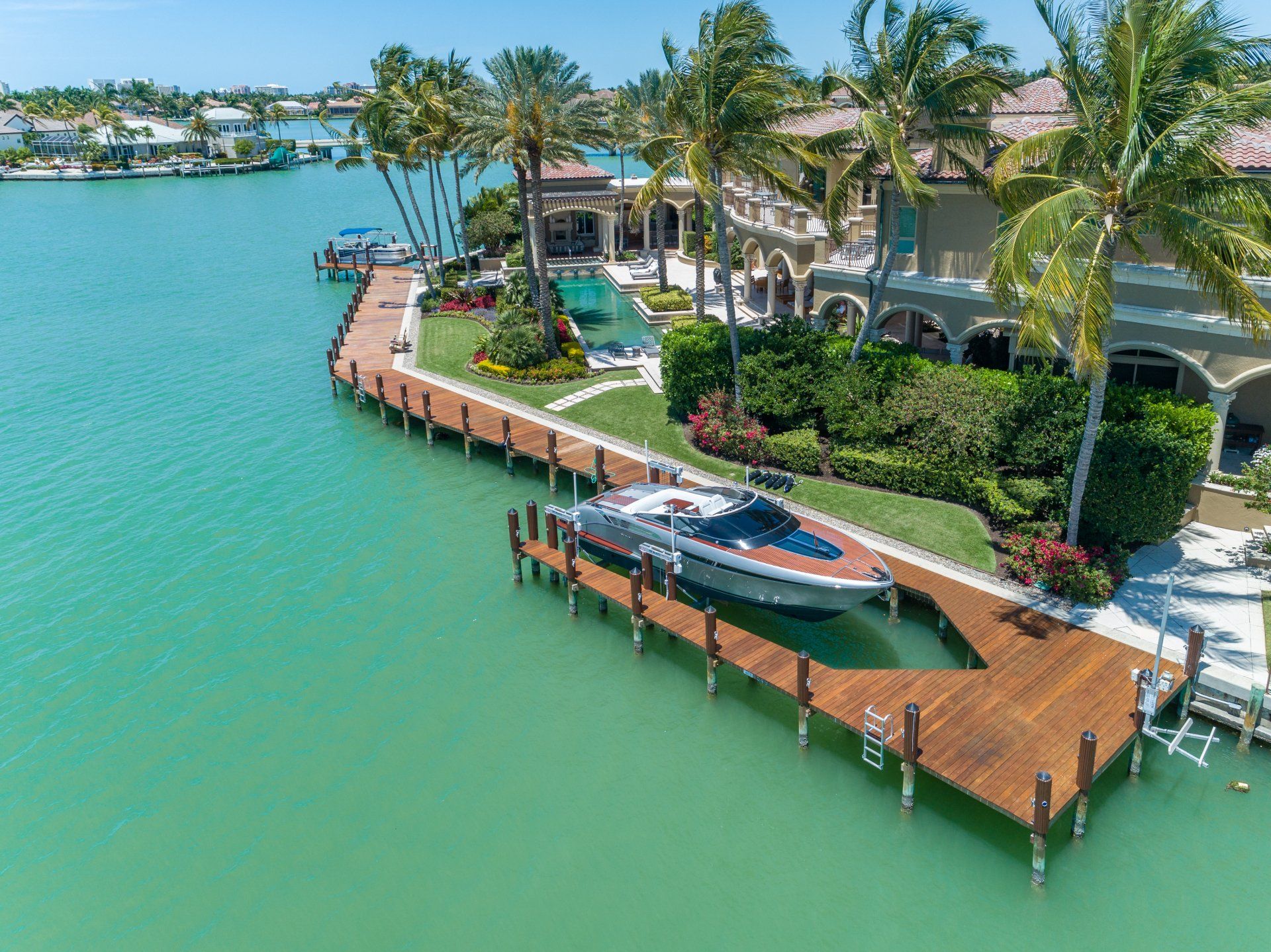 Aerial View of Decked Boat — Marco Island, FL — Collier Seawall & Dock