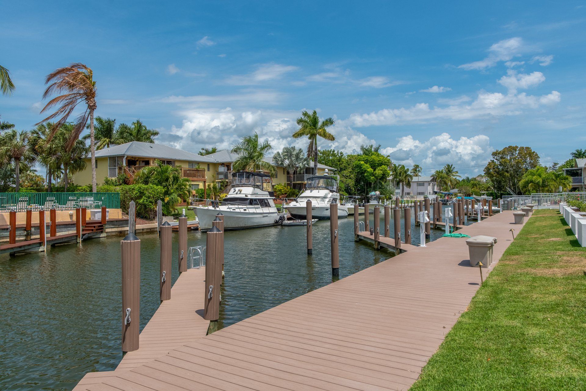 Many White Boats — Marco Island, FL — Collier Seawall & Dock