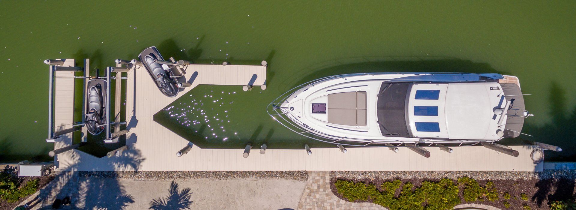 Boat Going to the Deck — Marco Island, FL — Collier Seawall & Dock