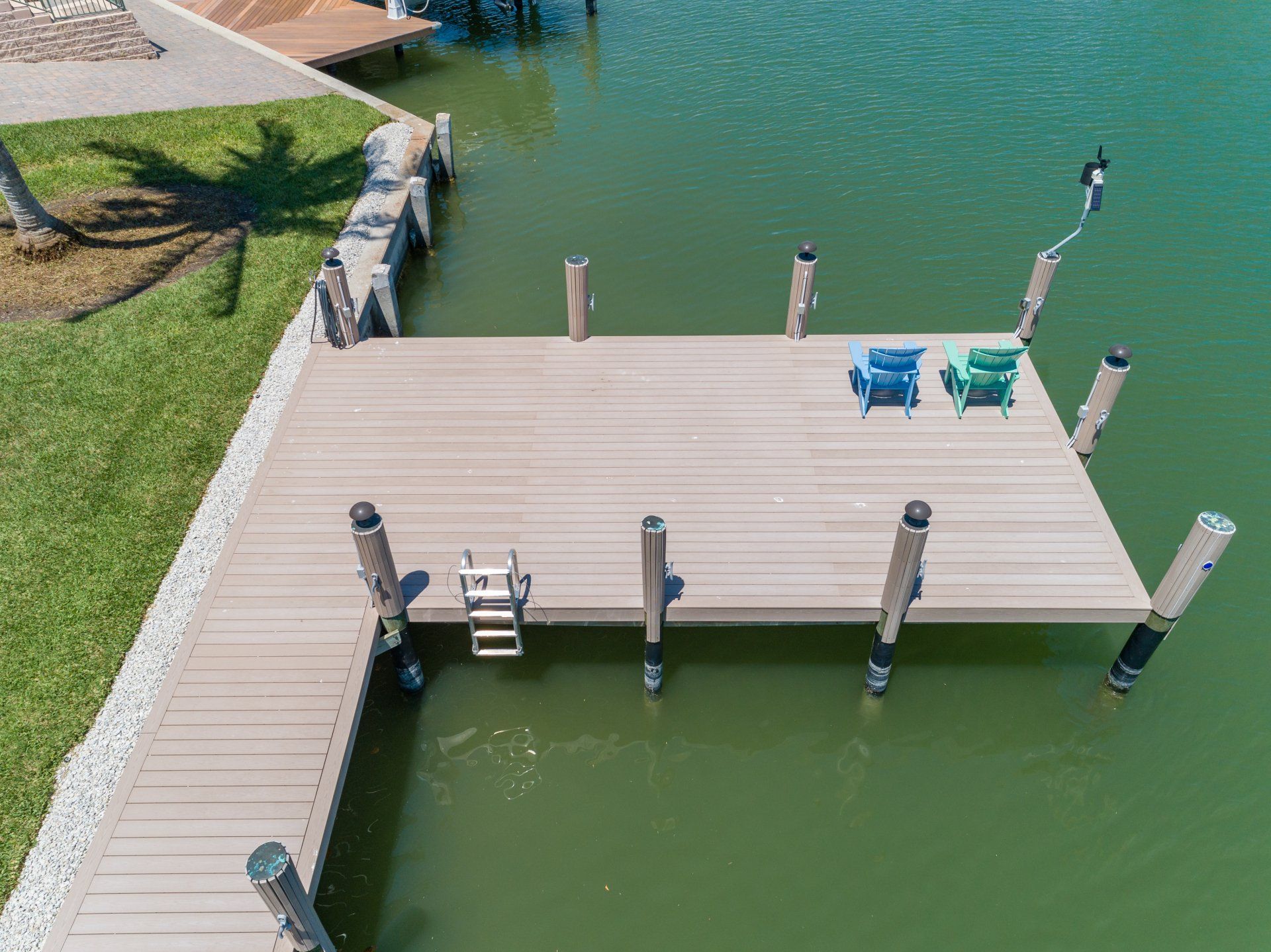 Deck with Two Chairs — Marco Island, FL — Collier Seawall & Dock
