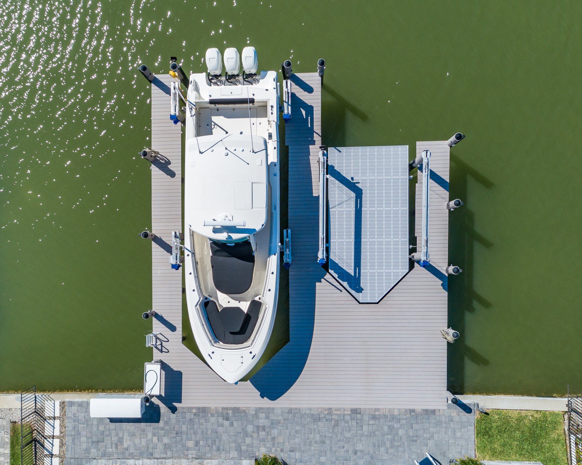 Parked Large Yacht — Marco Island, FL — Collier Seawall & Dock