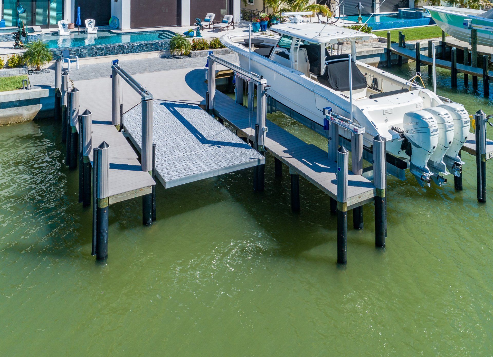 Regular Boat Lifts — Marco Island, FL — Collier Seawall & Dock